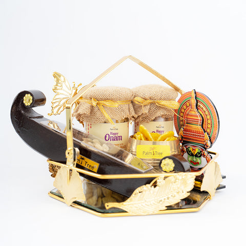 Grand Onam Festive Hamper – Brass Para, Kathakali, Banana & Jaggery Chips, Spices Boat